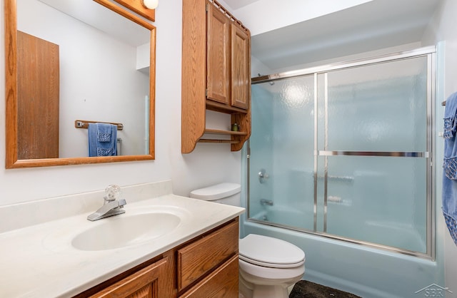 1653 Manchester Way, Gladwin, MI 48624 - bathroom featuring vanity and combined bath / shower with glass door