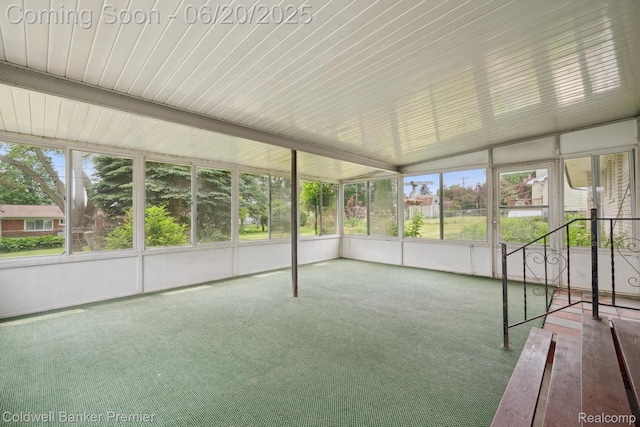 8077 Casa Mia Dr, White Lake, MI 48386 - unfurnished sunroom with carpet and healthy amount of natural light