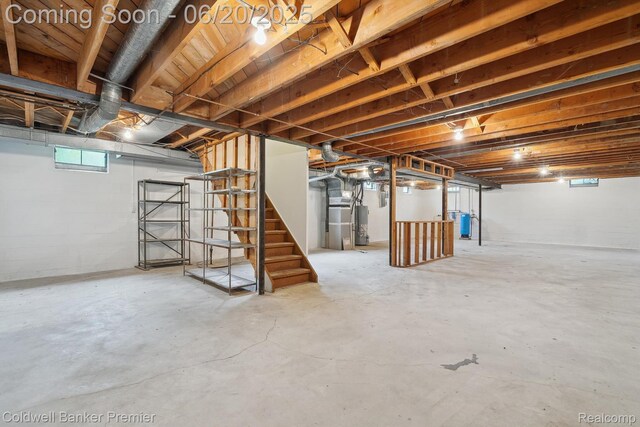 8077 Casa Mia Dr, White Lake, MI 48386 - below grade area with gas water heater and stairs