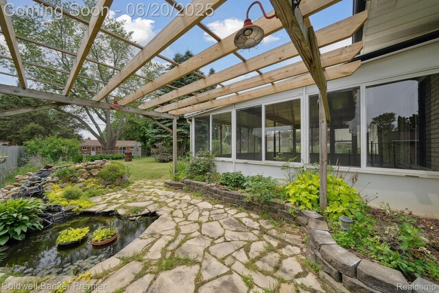 8077 Casa Mia Dr, White Lake, MI 48386 - view of patio with a garden pond and a pergola