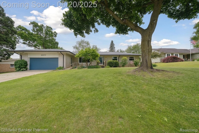8077 Casa Mia Dr, White Lake, MI 48386 - single story home featuring an attached garage, driveway, brick siding, and a front lawn