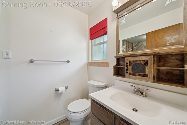 8077 Casa Mia Dr, White Lake, MI 48386 - bathroom featuring vanity and toilet