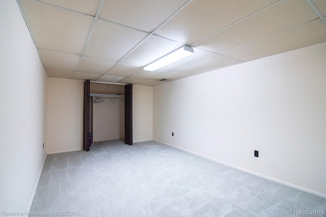 41195 Southwind Dr, Canton, MI 48188 - unfurnished bedroom featuring light colored carpet, a paneled ceiling, and a closet