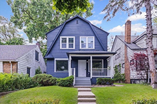 18419 Faust Ave, Detroit, MI 48219 - dutch colonial featuring a porch, a front yard, and a gambrel roof