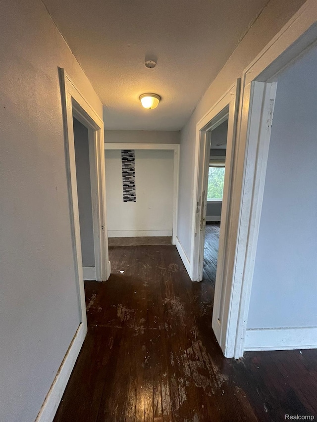 14200 Whitcomb St, Detroit, MI 48227 - corridor featuring hardwood / wood-style flooring and baseboards