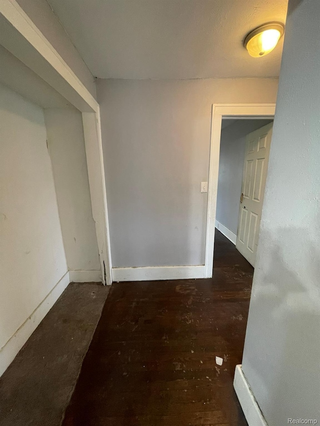 14200 Whitcomb St, Detroit, MI 48227 - unfurnished room featuring baseboards and wood finished floors