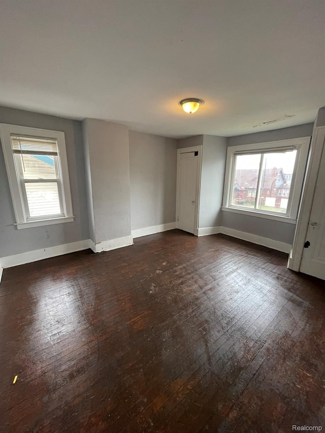 14200 Whitcomb St, Detroit, MI 48227 - empty room with dark wood-type flooring