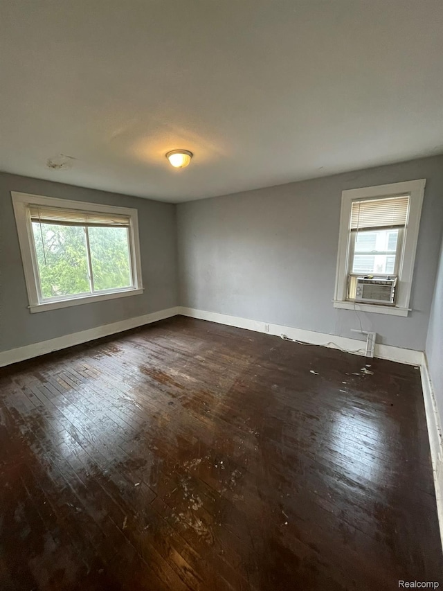 14200 Whitcomb St, Detroit, MI 48227 - spare room with hardwood / wood-style flooring and cooling unit