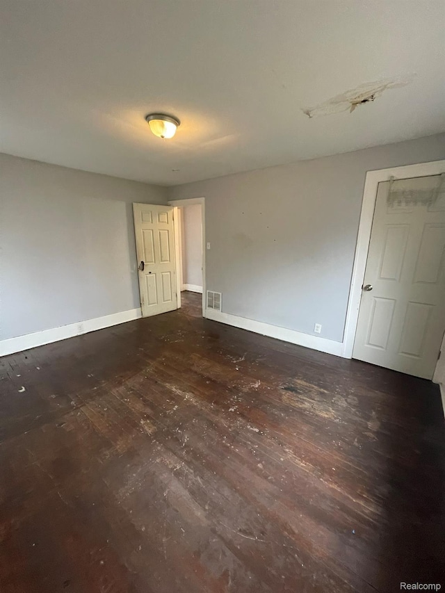 14200 Whitcomb St, Detroit, MI 48227 - empty room with wood finished floors and baseboards