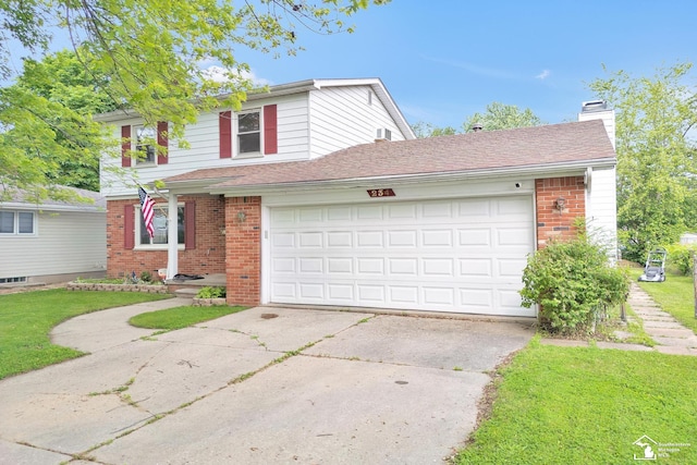 234 Crampton Dr, Monroe, MI 48162 - traditional-style house featuring brick siding, a chimney, driveway, and a garage