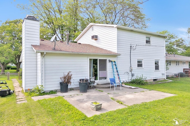 234 Crampton Dr, Monroe, MI 48162 - back of house featuring a chimney, a patio, and roof with shingles