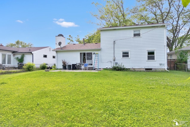 234 Crampton Dr, Monroe, MI 48162 - back of property with a patio and a chimney