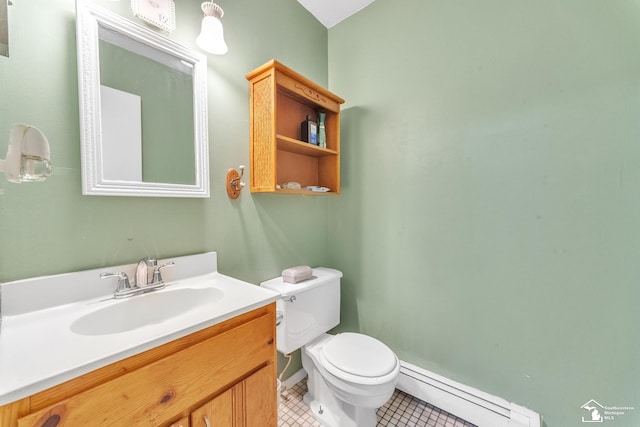 234 Crampton Dr, Monroe, MI 48162 - bathroom with baseboard heating, tile patterned flooring, and vanity