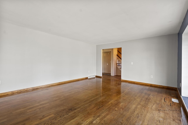 36254 Congress Rd, Farmington Hills, MI 48335 - unfurnished room featuring stairs and dark wood-type flooring