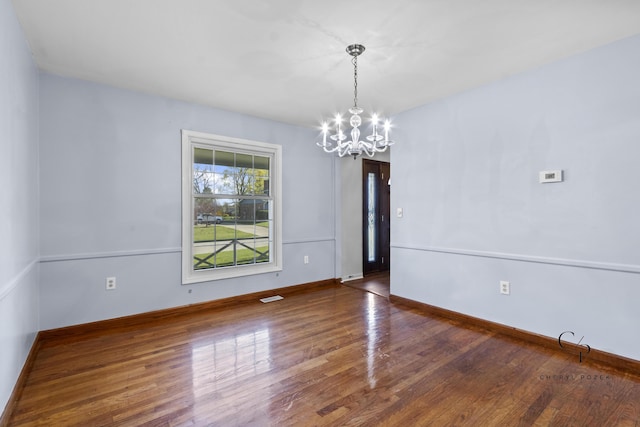 36254 Congress Rd, Farmington Hills, MI 48335 - unfurnished room featuring a chandelier and wood finished floors
