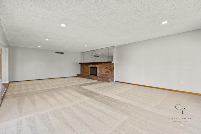 36254 Congress Rd, Farmington Hills, MI 48335 - unfurnished living room with carpet, a brick fireplace, recessed lighting, and a textured ceiling