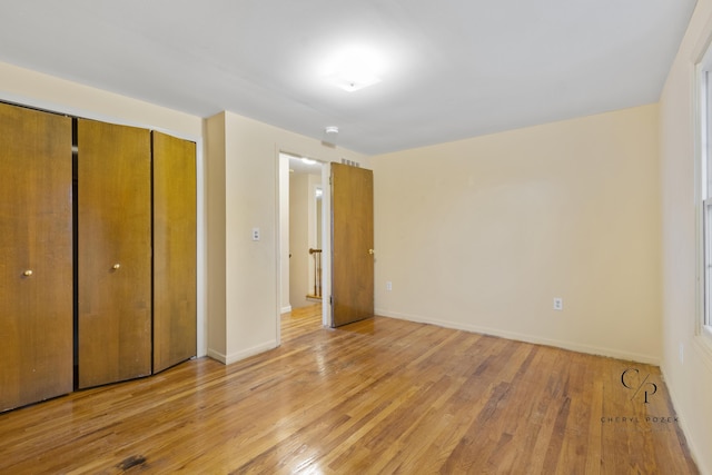 36254 Congress Rd, Farmington Hills, MI 48335 - unfurnished bedroom featuring light wood finished floors and a closet
