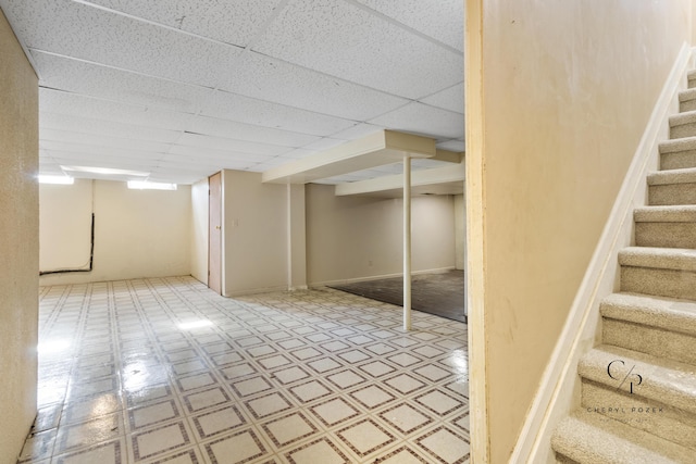 36254 Congress Rd, Farmington Hills, MI 48335 - finished below grade area featuring tile patterned floors, stairway, and a paneled ceiling