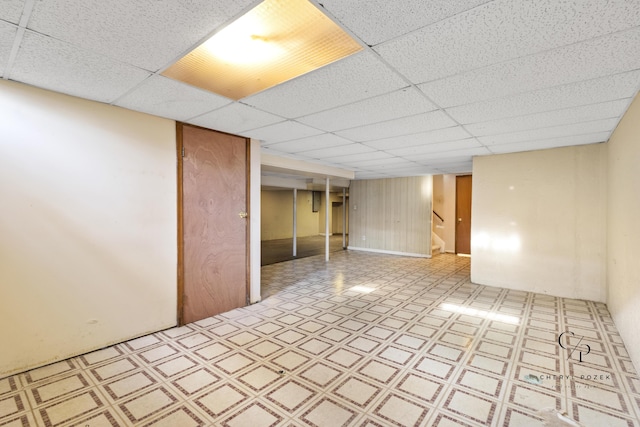 36254 Congress Rd, Farmington Hills, MI 48335 - finished basement featuring tile patterned floors, a paneled ceiling, and stairs