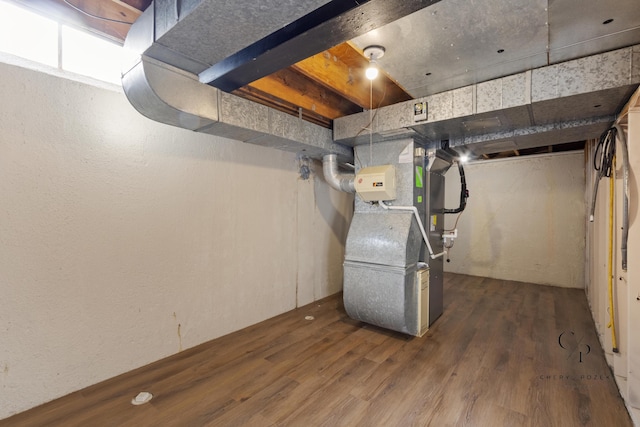 36254 Congress Rd, Farmington Hills, MI 48335 - unfinished below grade area with heating unit and wood finished floors
