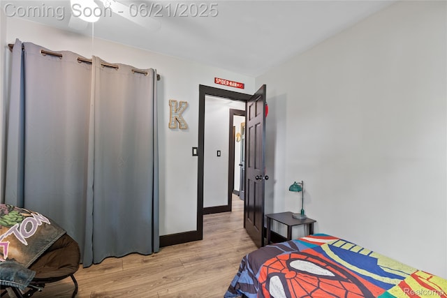 527 Tanview Dr, Oxford, MI 48371 - bedroom featuring light wood finished floors and baseboards