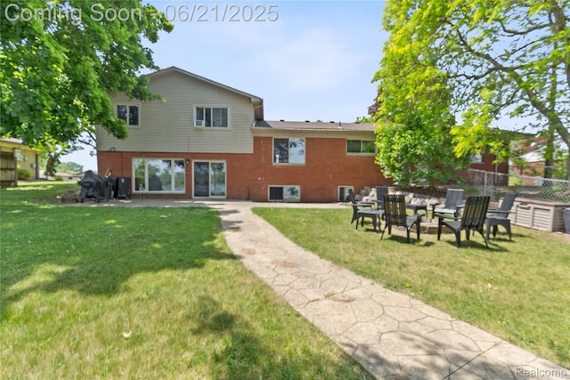 527 Tanview Dr, Oxford, MI 48371 - rear view of house with brick siding