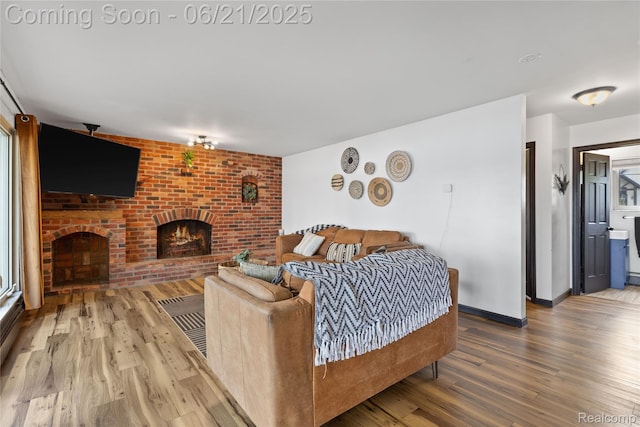 527 Tanview Dr, Oxford, MI 48371 - living area with a fireplace and wood finished floors