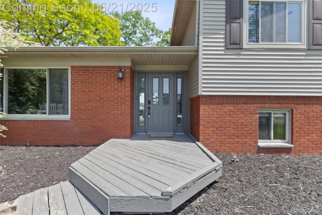527 Tanview Dr, Oxford, MI 48371 - doorway to property with brick siding