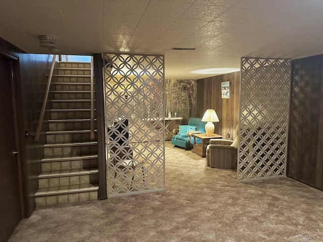 5697 Dunrovin Dr, Saginaw, MI 48638 - lobby featuring stairway and wooden walls