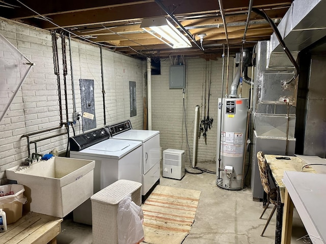 5697 Dunrovin Dr, Saginaw, MI 48638 - washroom featuring water heater, independent washer and dryer, brick wall, electric panel, and heating unit