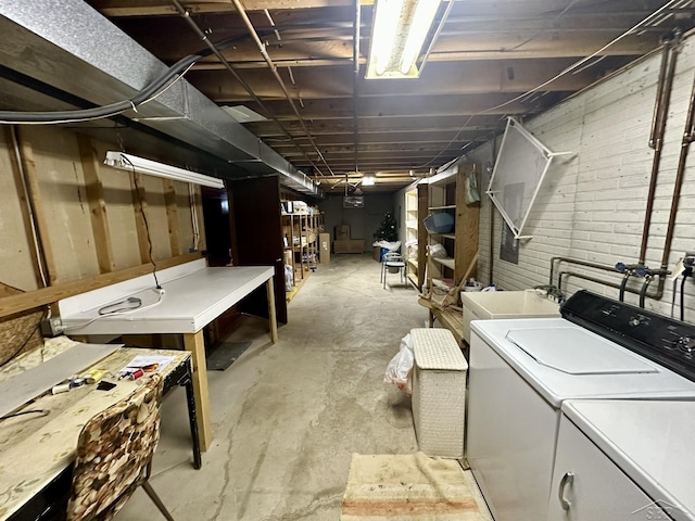 5697 Dunrovin Dr, Saginaw, MI 48638 - unfinished basement with washing machine and clothes dryer