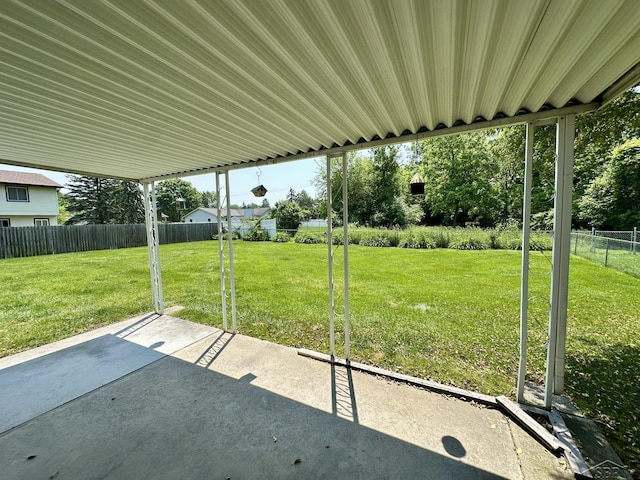 5697 Dunrovin Dr, Saginaw, MI 48638 - fenced backyard with a patio area