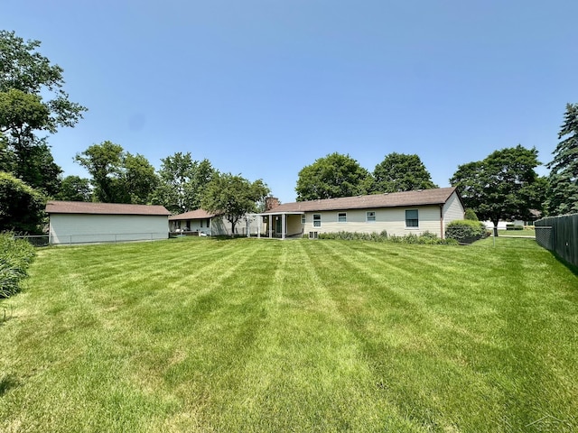 5697 Dunrovin Dr, Saginaw, MI 48638 - rear view of property