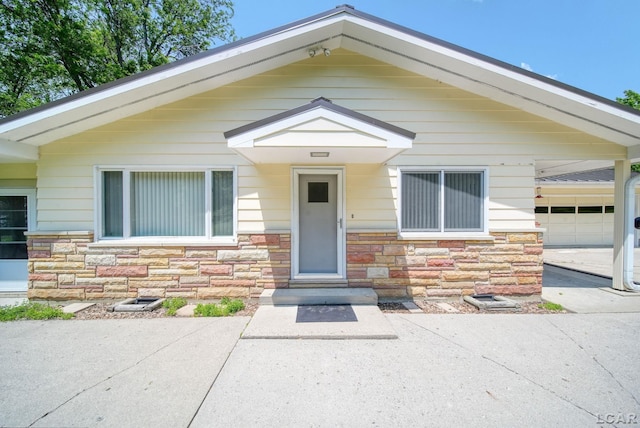 9760 Lime Lake Rd, Hudson, MI 49247 - view of front of home featuring stone siding