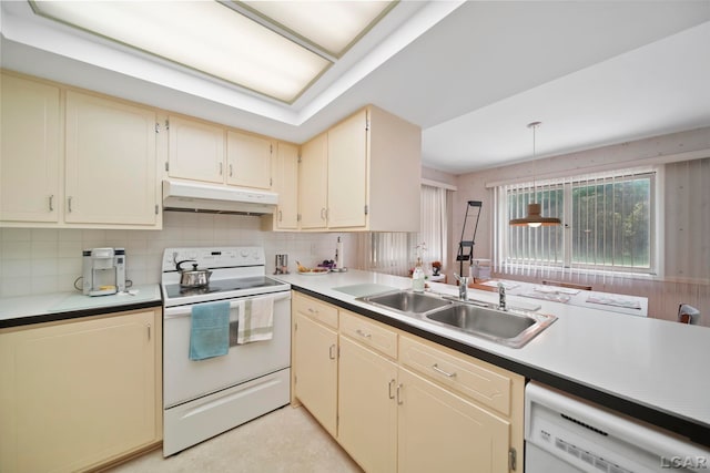 9760 Lime Lake Rd, Hudson, MI 49247 - kitchen featuring white appliances, under cabinet range hood, tasteful backsplash, hanging light fixtures, and cream cabinets