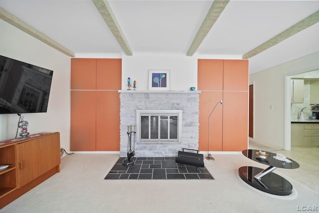 9760 Lime Lake Rd, Hudson, MI 49247 - carpeted living area featuring beam ceiling and a fireplace with flush hearth