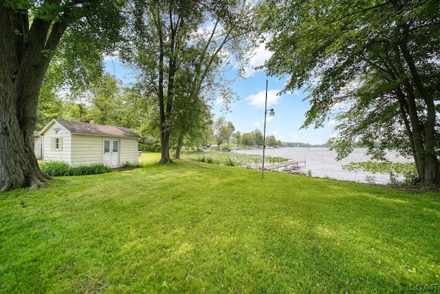 9760 Lime Lake Rd, Hudson, MI 49247 - view of green lawn featuring an outdoor structure