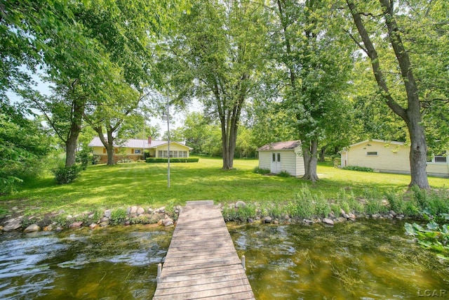 9760 Lime Lake Rd, Hudson, MI 49247 - dock with a yard and a water view