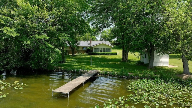 9760 Lime Lake Rd, Hudson, MI 49247 - dock with a lawn and a water view