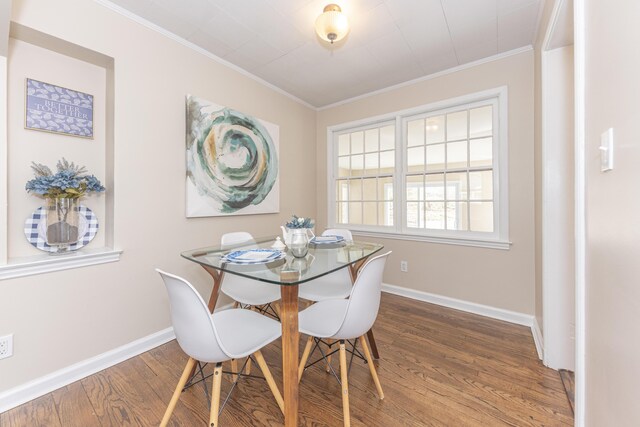 1215 Prescott Ave, Ann Arbor, MI 48103 - dining room featuring wood finished floors and ornamental molding