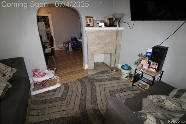 123 Adelaide St, Pontiac, MI 48342 - living area featuring wood finished floors and arched walkways