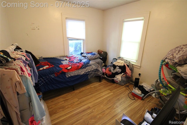 123 Adelaide St, Pontiac, MI 48342 - bedroom featuring wood finished floors and multiple windows