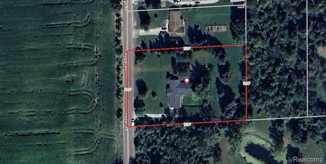 11057 Hogan Rd, Fenton, MI 48436 - aerial view of property's location featuring property boundaries highlighted