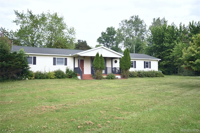 11057 Hogan Rd, Fenton, MI 48436 - ranch-style house featuring covered porch and a front lawn