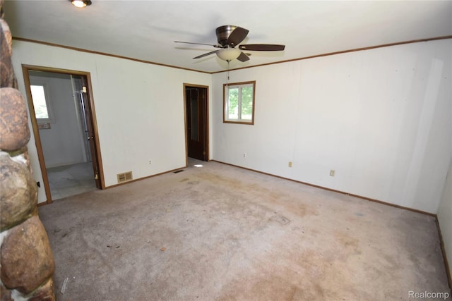 11057 Hogan Rd, Fenton, MI 48436 - unfurnished bedroom featuring light carpet, ornamental molding, and ensuite bathroom