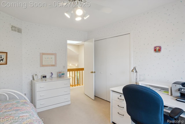 35606 Huntsman Ct, Farmington Hills, MI 48331 - bedroom featuring a desk, a closet, wallpapered walls, and light carpet