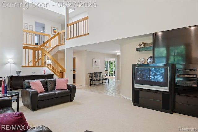 35606 Huntsman Ct, Farmington Hills, MI 48331 - living room featuring a high ceiling, stairway, tile patterned floors, and carpet floors