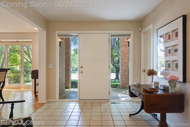 35606 Huntsman Ct, Farmington Hills, MI 48331 - entrance foyer with healthy amount of natural light and light tile patterned flooring