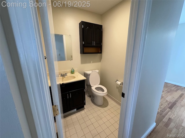 3163 Mystic Valley Dr, White Lake, MI 48383 - bathroom with vanity and wood finished floors
