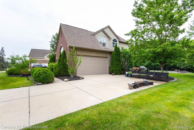 23640 Woodside Ct, South Lyon, MI 48178 - view of home's exterior with an attached garage, roof with shingles, driveway, a yard, and brick siding